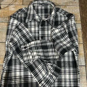 Stylish & versatile design. Button-front, with long sleeves & very comfortable.